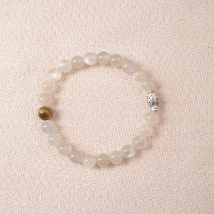 Moonstone bracelet with soft white shimmer, symbolizing calm energy and emotional balance.