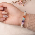 Back view of jade energy bracelet highlighting its polished jade texture and balanced design.