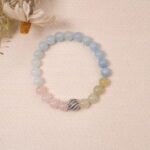 Lifestyle photo of Tranquil Harmony bracelet, placed elegantly with delicate accessories, radiating calm energy.