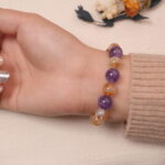 Back view of citrine and amethyst bracelet highlighting the harmony of natural gemstones.