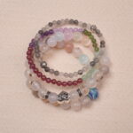 Crystal bracelet stack designed for the Calm intention, combining multiple gemstones to promote harmony and inner peace.