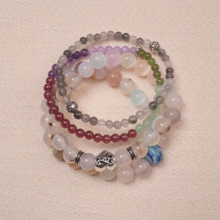Crystal bracelet stack designed for the Calm intention, combining multiple gemstones to promote harmony and inner peace.