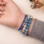 Model wearing the Ocean Whisper communication bracelet stack, enhancing self-expression and emotional balance.2