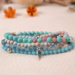 Heart charm detail from the Lucky Horizon bracelet stack, symbolizing hope and the courage to follow one’s dreams.