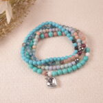 Good luck bracelet stack displayed in warm natural light, radiating energy of abundance and optimism.