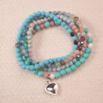 Good luck intention bracelet stack with turquoise tones, symbolizing positivity, protection, and fresh opportunities.