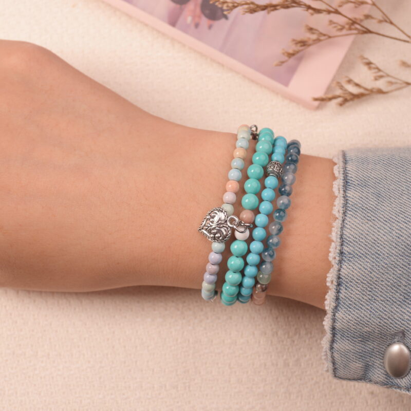 Model wearing the Lucky Horizon good luck bracelet stack, attracting positivity and fortune through turquoise energy.1