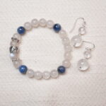 A beautiful set featuring a Moonstone and Kyanite bracelet paired with matching Clear Quartz earrings, designed to bring harmony and tranquility with their elegant energy.