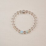 Clear Quartz beaded bracelet with a textured silver bead – main product image.