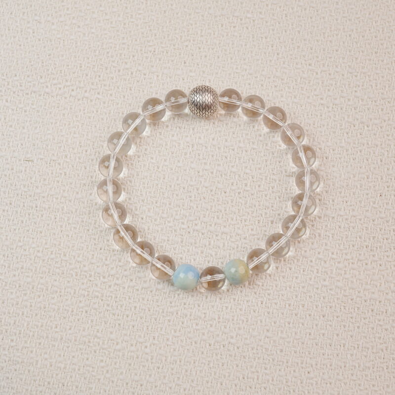 Clear Quartz beaded bracelet with a textured silver bead – main product image.