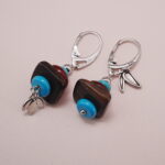 Close-up of Turquoise, Tiger's Eye, and Red Agate Earrings with Silver Leaf Charm - Detail Image