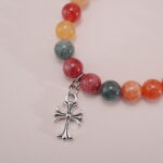 Close-up of Multicolor Chalcedony Bracelet with Cross Pendant - Detail Image