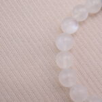 Close-up detail of smooth White Moonstone beads.