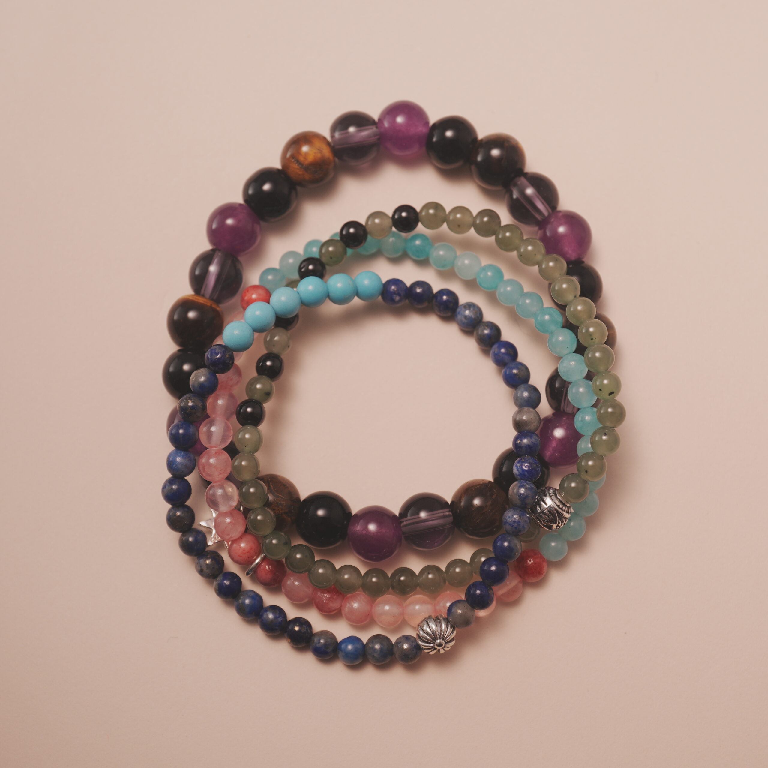 protection-crystal-bracelet-stack-main.jpg Protection crystal bracelet stack designed to balance energy and shield your spirit with calming, grounding power.
