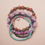 Good luck crystal bracelet stack designed to attract positive energy and joyful opportunities.