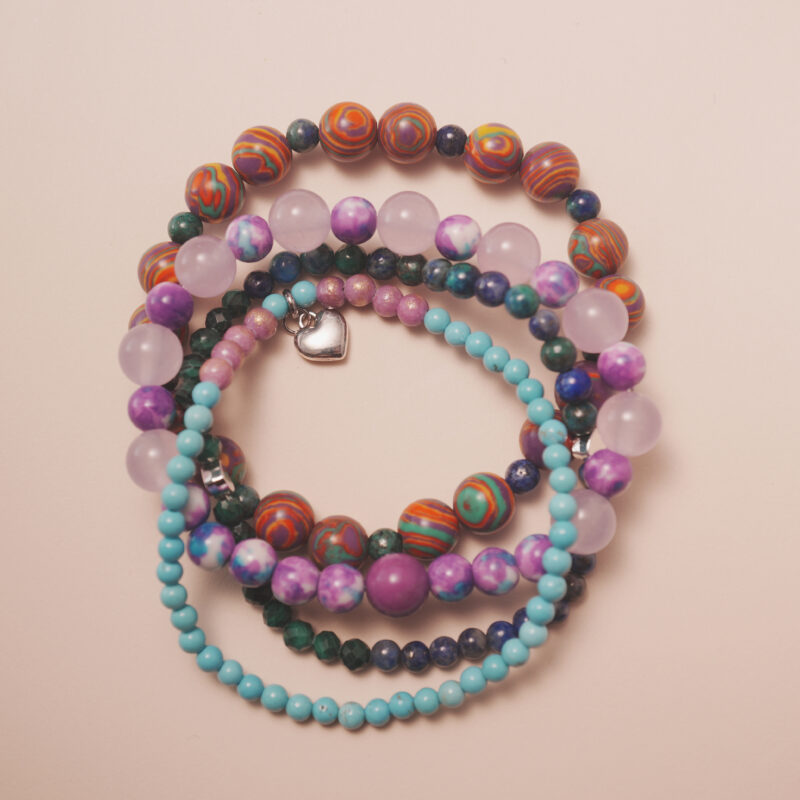 Good luck crystal bracelet stack designed to attract positive energy and joyful opportunities.