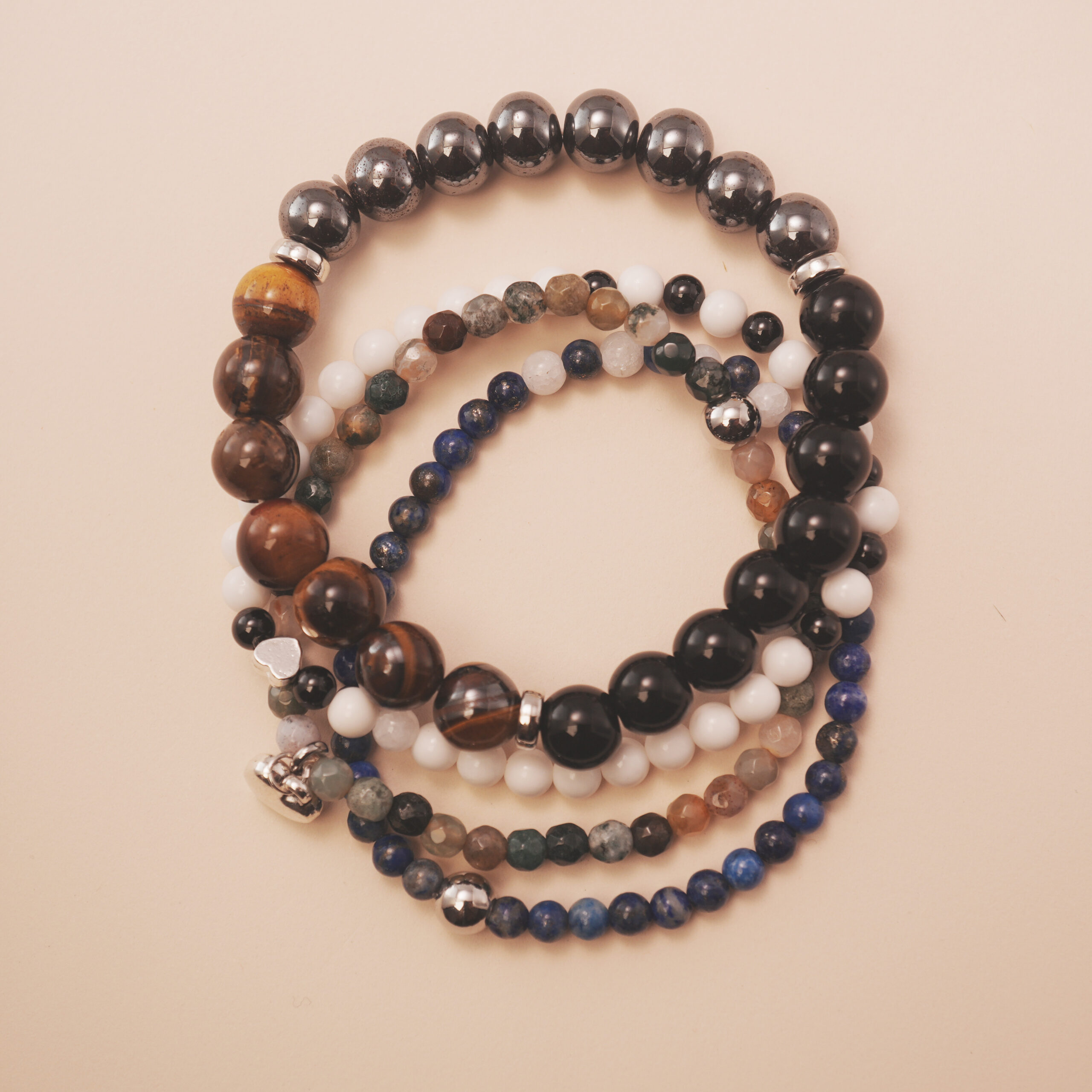 midnight-guardian-protection-bracelet-stack-main.jpg Midnight Guardian protection bracelet stack designed to ground your energy and shield from negativity