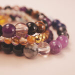 Close-up of the Rainbow Fortune bracelet stack showing colorful harmony and radiant flow of energy.
