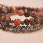 Angled view of the wealth bracelet stack symbolizing growth, opportunity, and good fortune.